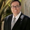 Scott E.