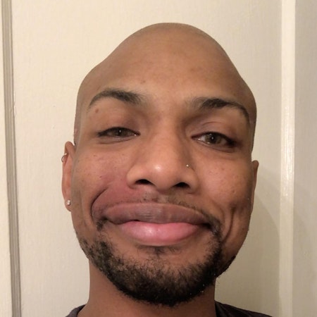 Travis J.